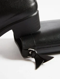 La botte de pluie haute à talon, aux détails équestres - Noir