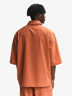 La chemise mixte ample Aigle Experience by Études - Orange