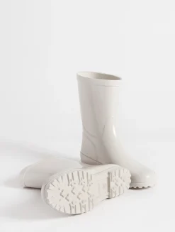 Le bottillon de pluie verni - Beige