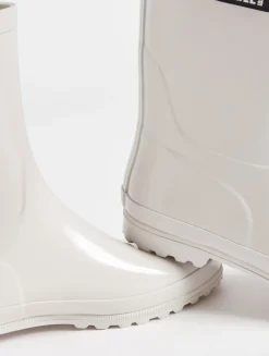Le bottillon de pluie verni - Beige