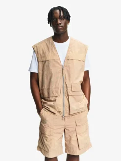 Le gilet de pêcheur mixte Aigle Experience by Études - Beige