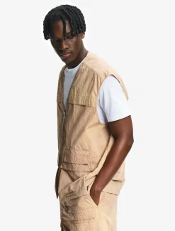 Le gilet de pêcheur mixte Aigle Experience by Études - Beige
