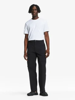 Le pantalon mixte multipoches Aigle Experience by Études - Noir