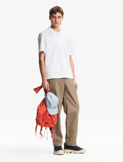 Polo DRY FAST TEXTILE® anti-UV avec logo sur la poitrine - Blanc