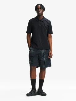 Polo DRY FAST TEXTILE® anti-UV avec logo sur la poitrine - Noir